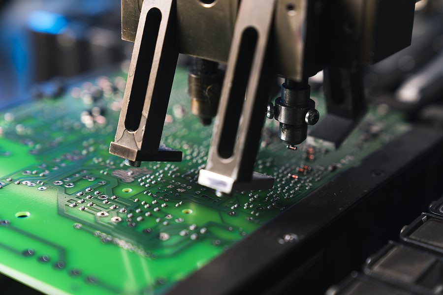 Close up photo of surface-mount device working on a printed circuit board